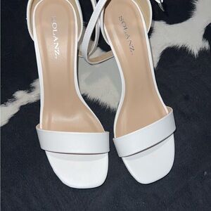 White Stiletto Heels with Open Toe and Sleek Design
